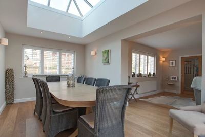 Photo of stunning new interior after renovation - open plan with roof lights